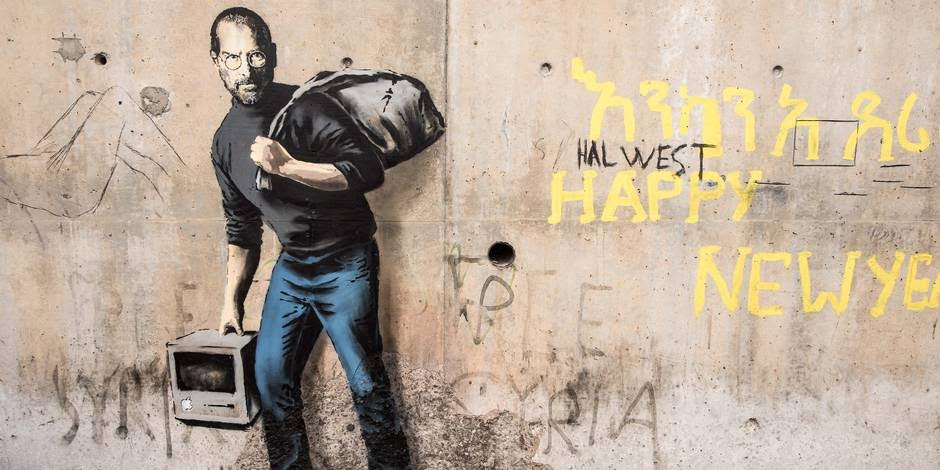 Peinture de Street Art de Steve Jobs imaginé en migrant sur les murs de Calais 